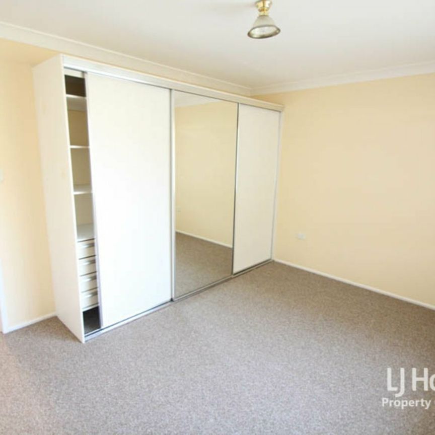 Spacious Highset Home with Multiple Living Areas - Photo 1