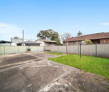 Spacious Four-Bedroom Home with Renovated Kitchen & Generous Backyard - Photo 5