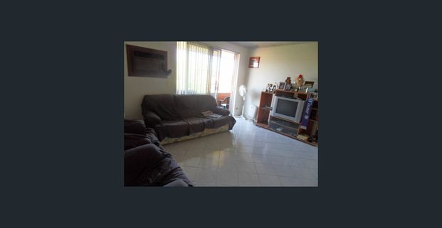 Top Floor Unit in a Great Location! - Photo 1