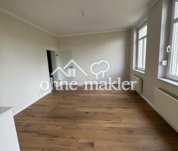Hauscharakter Charmante 5,5-Zimmer-Altbauwohnung mit Einbauküche un... - Photo 2