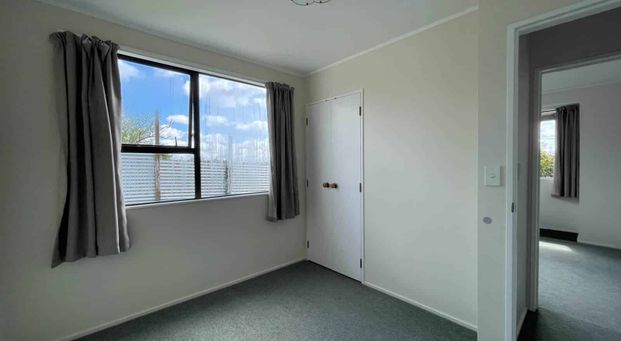 Sunny Two-Bedroom Home with Spacious Yard - Photo 1