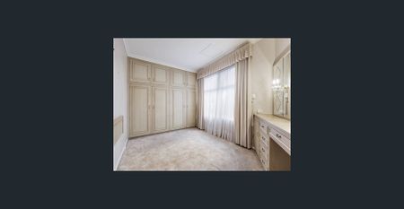 Spacious Five-Bedroom Home with Pool in Prime Location - Photo 4