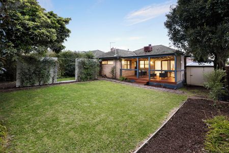 Neat & Tidy 3 Bedroom Home On a "Beach-Side of the Highway" Position! - Photo 5