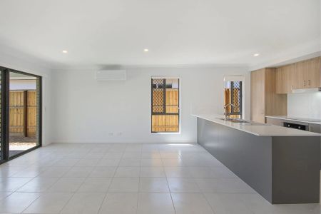 A modern sanctuary in a peaceful, family-friendly pocket, this beautifully finished 4-bedroom home delivers effortless living with a touch of luxury. - Photo 2