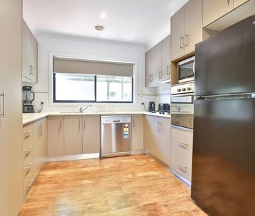 Charming 3-Bedroom, 2-Bathroom Townhouse - Photo 1