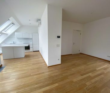 Moderne 2-Zimmer-DG-Maisonette mit tollen Freiflächen direkt im Zen... - Foto 4