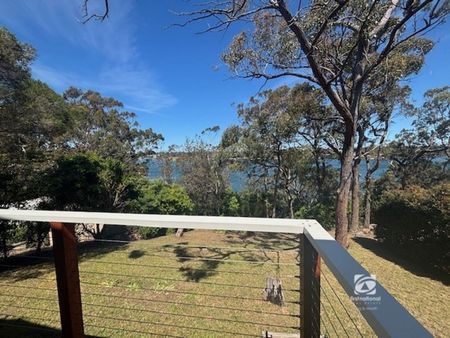 FRESHLY RENOVATED ON THE LAKES EDGE! - Photo 5