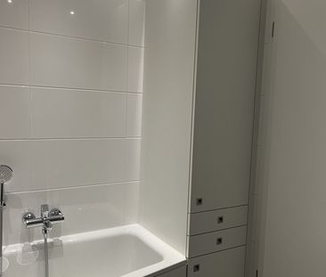 Moderne Neubauwohnung mit Loggia, Terrasse und Garten – inkl. TG-St... - Photo 6