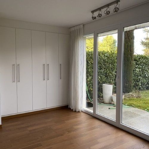 Appartement moderne de 5½ pièces avec jardin, cheminée et cave à vin - Photo 1
