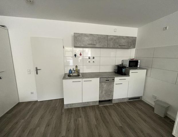 Apartment mit Einbauküche im- Erdgeschoss + Balkon - Foto 1