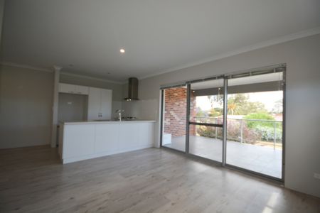 Modern Two Bedroom, Two Bathroom Upstairs Unit! - Photo 2