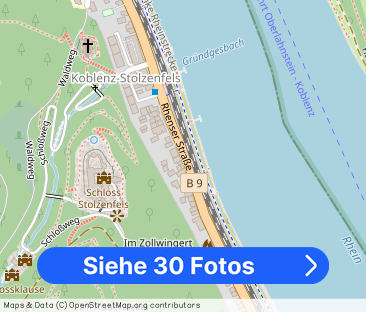 Großzügige Erdgeschoss Wohnung mit EBK, überdachter Terrasse, Garte... - Foto 1