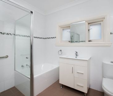 Neat Family Home in a Prime Family-Friendly Location - Photo 4