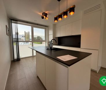 Nieuwbouwwoning met 3 slaapkamers, carport en tuin - Photo 2