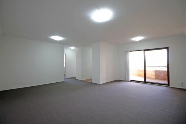 ULTRA MODERN RENOVATED 2 BEDROOM APARTMENT WITH LOCK UP GARAGE - Photo 1