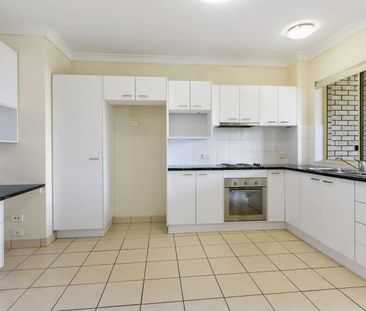 LOW MAINTENANCE WITH STUDY & COURTYARD - Photo 3