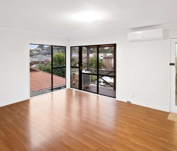 Elevated four-bedroom, two-bathroom home. - Photo 3