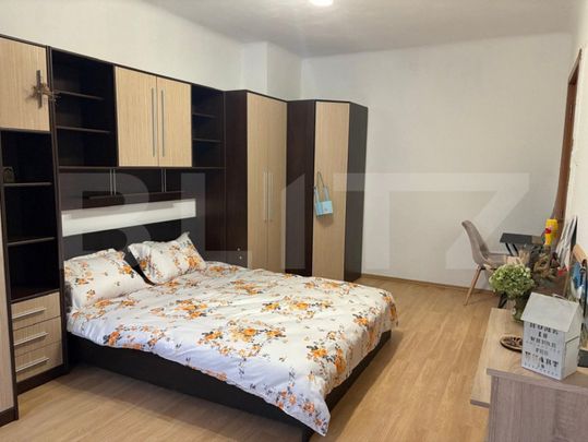 Garsoniera tip studio, 40 mp, mobilata, utilata zona buna - Fotografie 1