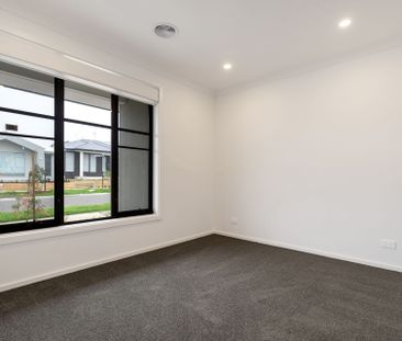 Feel Right at Home in This Charming Four-Bedroom home - Photo 3