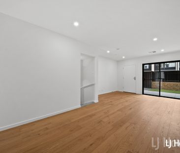 Stylish Split Level 2 Bedroom Home with Triple Garage - Photo 1