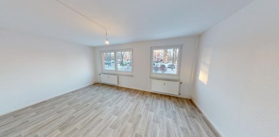 Geräumige 2-Raum-Wohnung mit Einbauküche - Foto 2