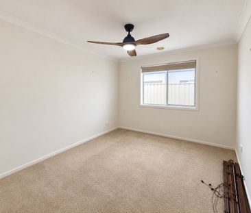 Modern 4-Bedroom Family Home with Spacious Living and Alfresco Area - Photo 5