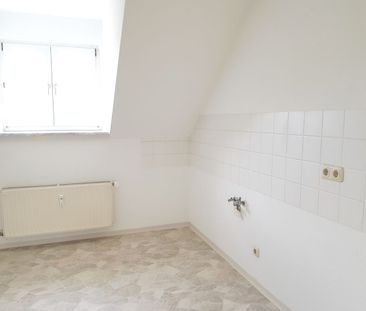 Lichtdurchflutete und großzügige 2-Zimmer-Dachgeschosswohnung im be... - Photo 5