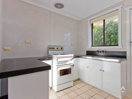 Conveniently located two-bedroom unit - Photo 5