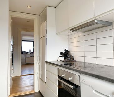 Udsigt over Limfjorden fra 4. sal – lys 2-værelses i Aalborg<br> - Foto 2