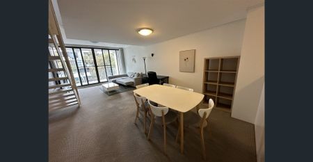 Fully Furnished Stunning Oversized Split-level Two Bedroom Apartment - Photo 2