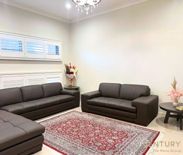 Spacious 6-Bedroom Family Home with Premium Features - Photo 2