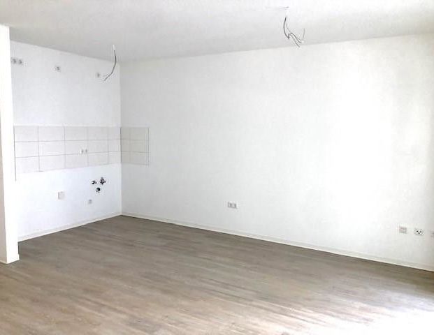 Neubau! Erstbezug! Schicke 1-Zimmerwohnung mit offener Wohnküche und Fußbodenheizung! - Photo 1