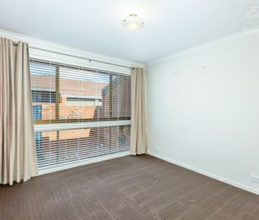 Fantastic Single Level Two Bedroom Townhouse with Garage - Photo 4