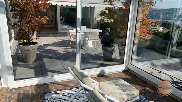 3-BEDROOM PENTHOUSE APARTMENT WITH LAKE VIEW - Photo 1