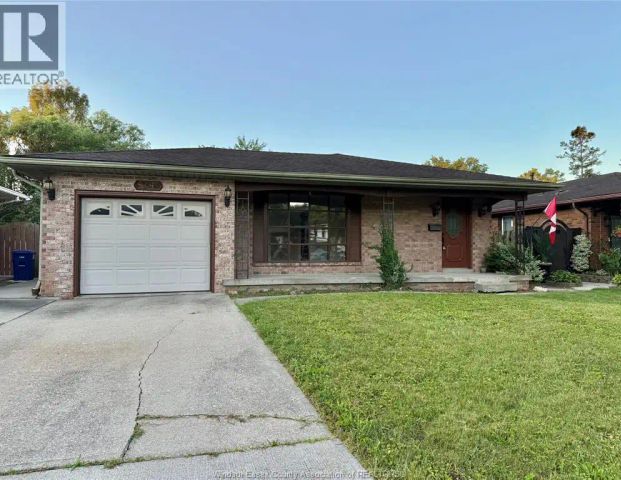 9495 Beachdale Unit# UPPER — 3 Bedroom - Photo 1