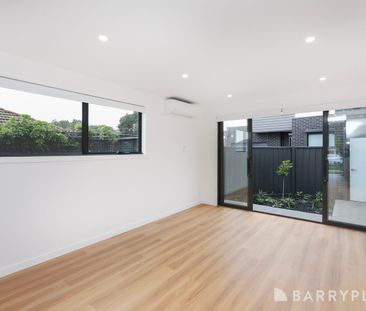 Brand New Contemporary Living with easy low maintenance lifestyle. - Photo 3