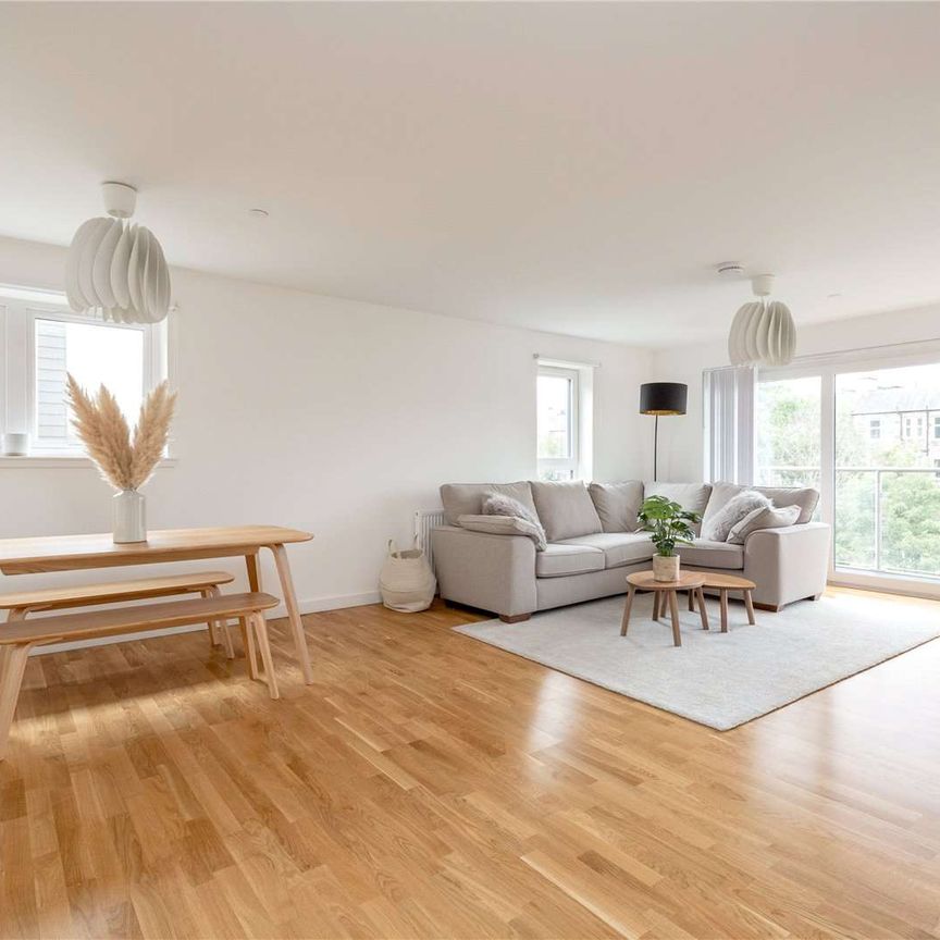 A stunning two bedroom furnished flat with two bathrooms at The Engine Yard Development, situated off Leith Walk. - Photo 1