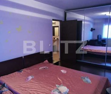 De inchiriat 2 camere, 59 mp, loc de parcare, mobilat si utilat! Zona strazii Florilor! - Photo 2