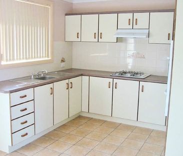 Three-Bedroom Home in Sought-After Albion Park Location - Photo 2