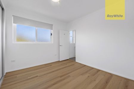 Sanctuary in the Sky: Renovated Top-Floor Apartment with Sweeping Views - Photo 3