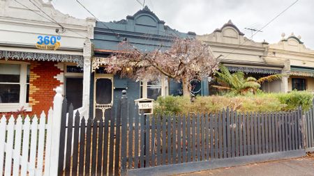 Charming 2-Bedroom Home with Courtyard Living in the Heart of Fitzroy North - Photo 5