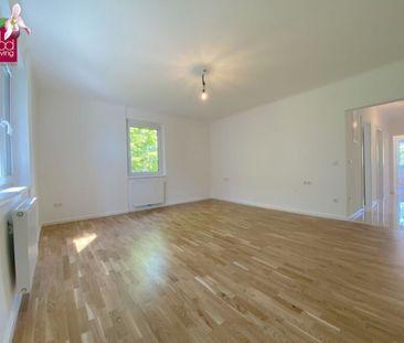 Helle 4-Zimmer-Wohnung mit Garage und Gemeinschaftsgarten in ruhige... - Foto 1
