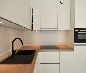 Gelijkvloers 1-slaapkamerappartement met terras te huur in centrum ... - Photo 5