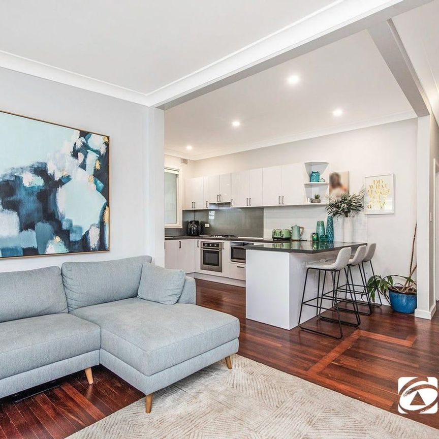 Renovated 4-Bedroom Home with Spacious Backyard - Photo 1