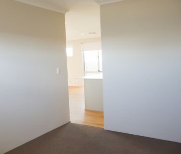 Live the Coastal Lifestyle in Brand New Four Bedroom Home! - Photo 3