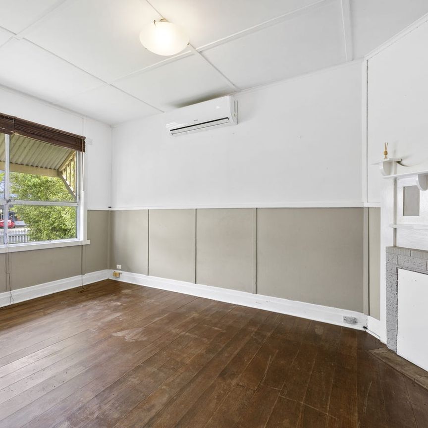 CENTRALLY LOCATED 3 BEDROOM HOME - Photo 1