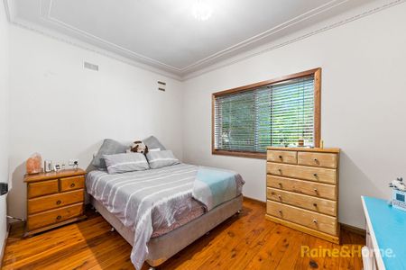 Cozy Family Home in a Convenient Ingleburn Location! - Photo 2