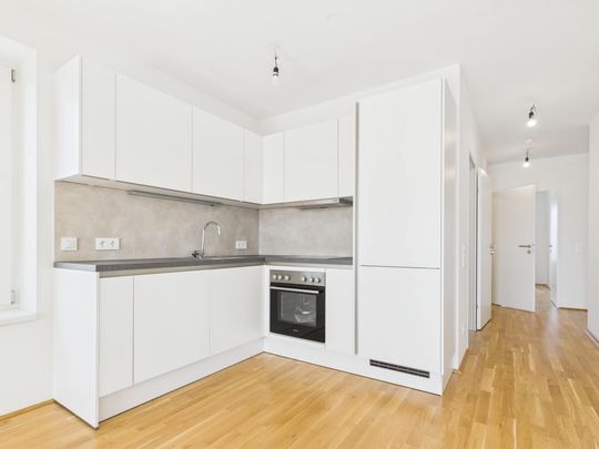 Urban Living im Wildgarten: 3-Zimmerwohnung mit Balkon - Foto 1