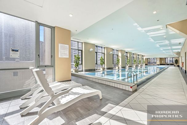 Freshly Renovated Two-Bedroom Apartment with City Views - Photo 1