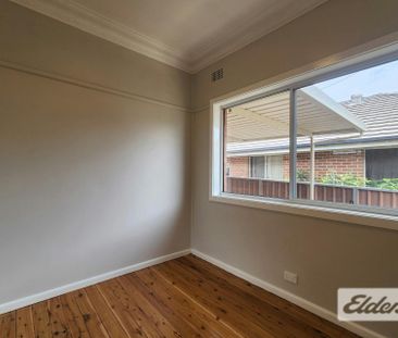 Freshly Updated Family Home in a Convenient Regents Park Location - Photo 6